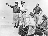Maj K.S. Chandpuri briefing Britain�s CIGS, Field Marshall Carver, on the Longewala Battle at Longewala in the Rajasthan sector.