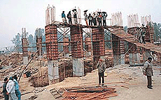 Work in progress on the railway overbridge at Bhankharpur level crossing on the Chandigarh - Ambala highway.