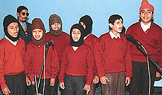 Children from the Institute For the Blind in Chandigarh present a song on the occassion of the birth anniversary of Louise Braille at Haryana Model Senior Secondary School, Sector 10, Panchkula.
