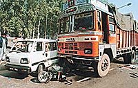 Traffic came to a standstill on the Chandigarh-Kalka Highway near the Mani Majra Housing Board Chowk after a Kinetic Honda, being ridden by two youngsters, was crushed under a truck .
