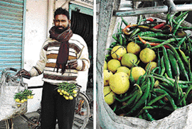 Om Parkash sells green chillies and lemons to ward off the evil eye.