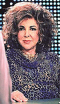Actress Elizabeth Taylor is interviewed by talk show host Larry King on "Larry King Live" at CNN studios in Los Angeles.