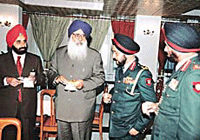 The Chief Minister of Punjab, Mr Parkash Singh Badal, interacts with the GOC-in-C, Western Command, Lieut-Gen Surjit Singh (extreme right), and the Chief of the Staff, Western Command, Lieut-Gen H.R.S. Mann, at the civil-military liaison conference in Chandi Mandir.