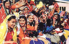 School girls in colourful dresses at the opening ceremony of the third Asian School Hockey Championship at Punjab Agricultural University, Ludhiana.