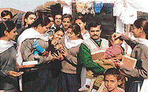 Students of Government Model Senior Secondary School, Sector 20-D, administer polio drops to children in Colony number 4 of Chandigarh.