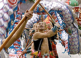 Dragon dancers perform for a Chinese Lunar New Year celebration at a park in Beijing on Monday. 
