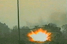 A bomb placed by a Hamas group explodes underneath an Israeli army armoured vehicle.