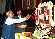 Prime Minister Vajpayee pays floral tributes to the photograph of Netaji Subhas Chandra Bose on his birth anniversary at the Central Hall of Parliament House in New Delhi.