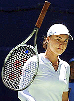 Martina Hingis bounces her racket in frustration during her loss to Jennifer Captriati in the sing les final at the Australian Open on Saturday.