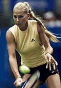 Russian Anna Kournikova makes a return against Japan's Saori Obata at the Pan Pacific Open Tennis Tournament in Tokyo on Wednesday.