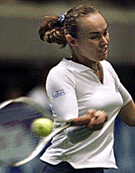 World number one Martina Hingis makes a forehand return against Zimbabwe's Cara Black at the Pan Pacific Open in Tokyo on Wednesday.