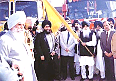 Mr Jagdev Singh Talwandi, President, SGPC, flags off a convoy, carrying relief material for the earthquake victims to Gujarat from Gurdwara Dukhniwaran in Ludhiana on Friday. 