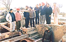 The Deputy Commissioner, Mr S.K Sandhu, along with a team of officials of the state Conservation Department inspect the house of Shaheed Kartar Singh at Sarabha, near here, on Friday.