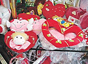 Gift items, including teddy bears, crystal hearts and flower sticks on display in the city for Valentine�s Day.