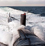 A Japanese fishing trawler carrying 35 persons, including a group of high school students, collided with a US nuclear submarine off Hawaii and nine persons were missing, the Japanese Coast Guard said on Saturday.