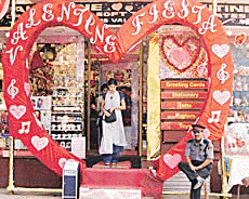 A giant Valentine�s Day heart frames the entrance of a shop selling romantic cards and toys in Mumbai on Monday. 