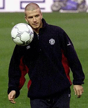 Manchester United soccer star David Beckham controls the ball during a training session at Valencia's Mestalla Stadium on tuesday.