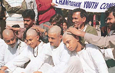 Members of the Youth Congress get their heads shaved in protest against Centre�s alleged failure to control violence against minorities in Jammu and Kashmir, in Sector 17 piazza, Chandigarh, on Thursday. 