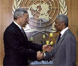 U.S. Secretary of State Colin Powell (left) shakes hands with United Nations Secretary General Kofi annan before a meeting on Wednesday, at the U.N. headquarters. 