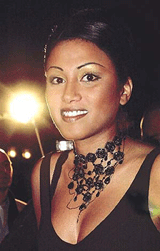 German rapper Sabrina Setlur, girlfriend of Boris Becker, smiles prior to a ceremony in Frankfurt on Thursday.