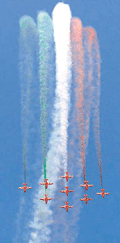Fighter aircraft from the Indian Air Force trail orange, white and green smoke -- the colours of the Tricolour --during aerobatics in Mumbai on Sunday. -- Reuters photo