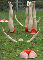 An undergrass-ballet created by German artist Henri Alain Unsenos, on display at a city park in Muenster, Germany on Tuesday.