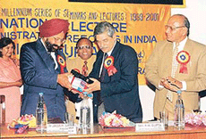 Dr Jasbir Singh Ahluwalia, Vice-Chancellor, Punjabi University, Patiala, presents a set of the university�s publications to Mr R.N. Gupta, GM of the Tribune Trust of Newspapers, at a seminar held on the campus on Tuesday.