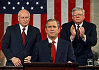 President George W. Bush is applauded by Vice-President Dick Cheney (left) and House Speaker Dennis Hastert as he addresses the joint session of Congress in Washington on Tuesday.