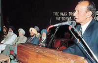 Brig Narinder Singh Sandhu addresses the National Convention of the War Decorated India at Tagore Theatre, Sector 18, Chandigarh, on Saturday. 