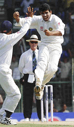 Zaheer Khan jumps into the air after dismissing Michael Slater