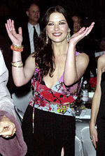 Actress Catherine-Zeta Jones dances to the music of Salsa singer Marc Anthony at Jaguar�s Tribute to Style Gala at Santa Monica, California, on Sunday.