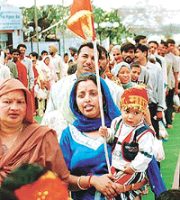 Devotees queue up to pay obeisance at the Mata Mansa Devi shrine