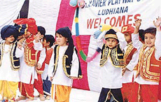 Students of St Xavier Playway School perform bhangra on Thursday.