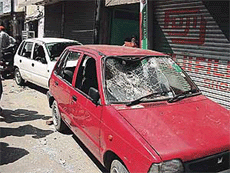 Cars damaged by a group of about 30 persons after a clash in Ghumar Mandi, Ludhiana, on Sunday.