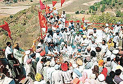 Members of the Anandgarh Hatao Sanjhi Sangharsh Committee perform a havan at the Jyanti Devi Temple, Jayanti Majari village (Ropar) on Sunday. 
