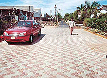 A resident of Phase 3B1 (H. No 840) has relaid the road in front of his house with tiles.