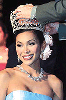 Gun Rumgchao, 25-year-old winner of Thailand�s third annual Miss Tiffany pageant for Transvestites and Transsexuals, is crowned in the Thai coastal resort town of Pattaya late on Saturday.�