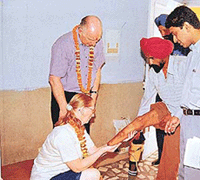 Mr Alan Smith and his wife, Lynn, of the Rotary Club Jersey, UK, examines a patient at Saket Hospital in Panchkula on Monday. 