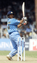 Sachin Tendulkar hits a boundary during the fourth one-day international between India and Australia in Visakhapatnam on Tuesday. 