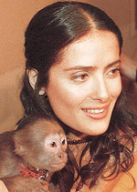 Mexican actress Salma Hayek poses with a monkey during a press conference to promote her new film, "Frida", based on the life of the famous Mexican painter Frida Kalho, in Mexico city�s Churubusco studios on Thursday.