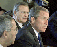 US President George W. Bush answers a question during a meeting of the Cabinet
