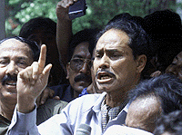Bangladesh's former President Ershad speaks to his supporters soon after his release from jail