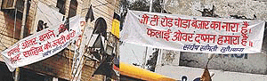 Black flags and banners put up by the �Sangharsh Samiti of Chaura Bazar and GT Road traders against the elevated road project in Ludhiana.