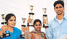 The three 1998 Asian Games stalwarts (from left) Neelam J. Singh, Sunita Rani and Paramjeet Singh after receiving awards at Punjab Bhavan in Chandigarh on Wednesday.