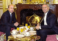 Russian Foreign Minister Igor Ivanov and U.S. Secretary of State Colin Powell meet over breakfast at the Russian ambassador's residence in Paris on Thursday. 