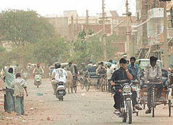 A strong duststorm catches people unawares in Chandigarh on Thursday.