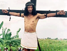 Filipino Bob Veles endures the pain of three-inch nails through his palms after he was crucified in a re-enactment of Christ's suffering in the small Philippine town of Cutud, about 80 km (50 miles) north of Manila, on Good Friday, April 13, 2001. The ritual is held every year in Cutud as the predominately Roman Catholic country commemorates the death of Christ. 