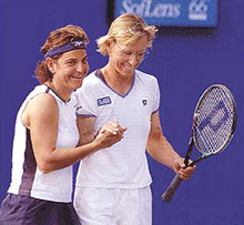 Arantxa Sanchez-Vicario (left) and her doubles partner Martina Navratilova congratulate each other after winning their doubles match at the Bausch & Lomb Championships in Amelia Island, Fla on Thursday Sanchez-Vicario and Navratilova defeated Kristina Brandi and Jill Craybas 6-1, 6-2. 
