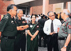 Deputy Director Medical Services, Western Command, Maj-Gen S.C. Sharma (extreme right) interacts with Air Vice Marshal O.P. Suri, while Commandant, Command Hospital, Maj-Gen Pratap Dayal (extreme left) looks on during a seminar on hospital management in Chandimandir on Monday.