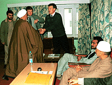SRINAGAR : Senior executive member of Hurriyat conference, Moulvi Abbass Ansari welcoming the Canadian delegation while the Hurriyat chairman, Prof Abdul Gani Bhat (first from right) watches them prior to the meeting between the two sides at the headquarters of Hurriyat conference at  Rajbagh in Srinagar on  monday.